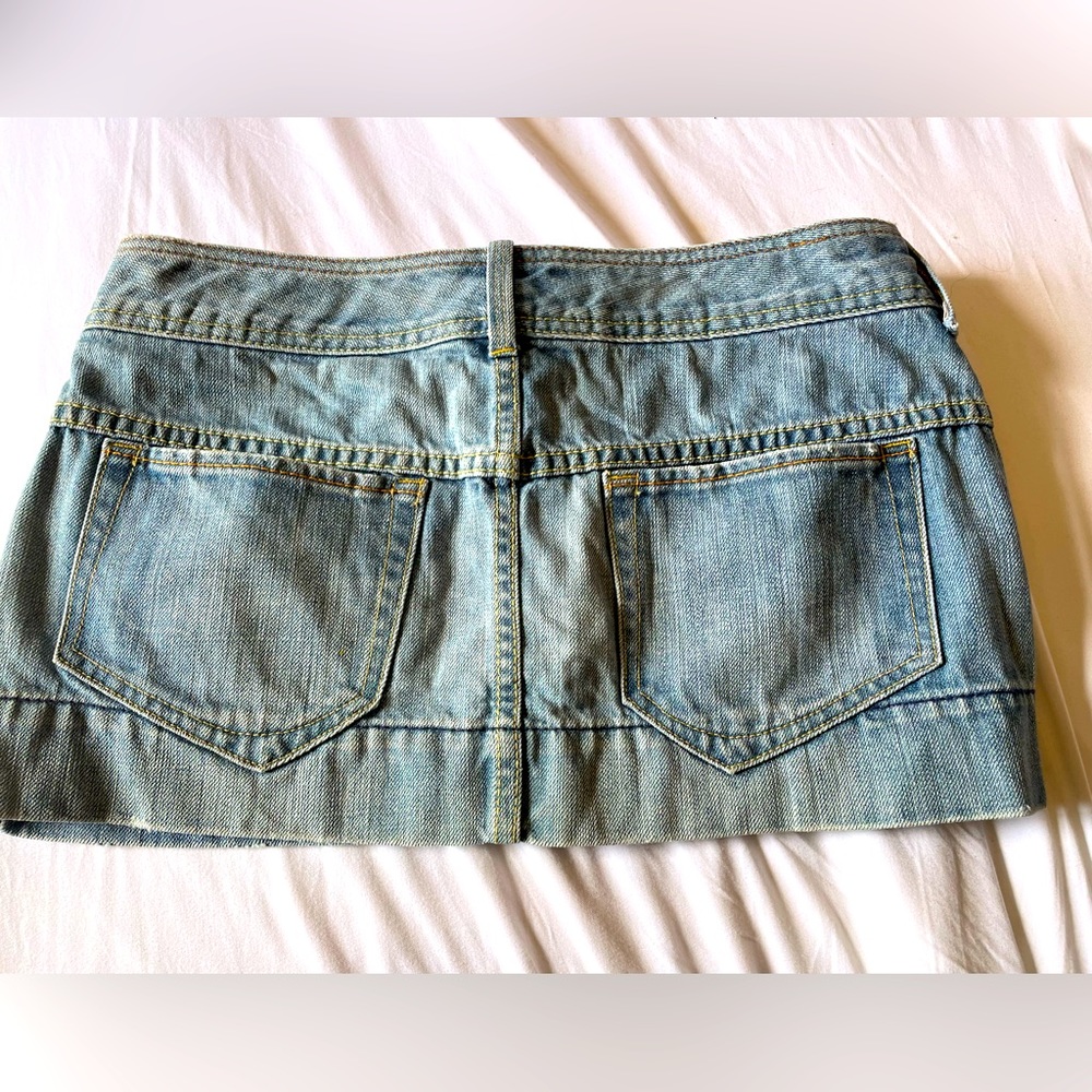 Adorable X2 Quality Denim Mini Skirt 
Size 4 
10 inches in length